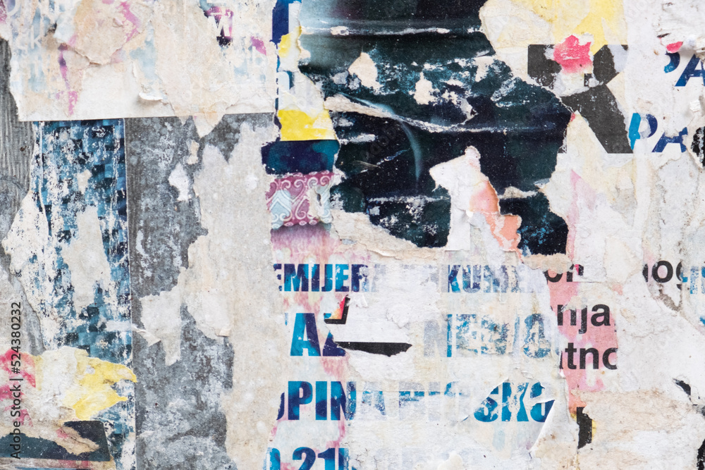 Fototapeta premium Torn grungy poster background. Abstract and ripped paper collage