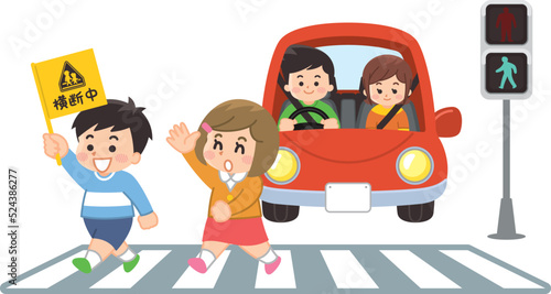 横断歩道を渡る子供　停止する自動車　交通安全