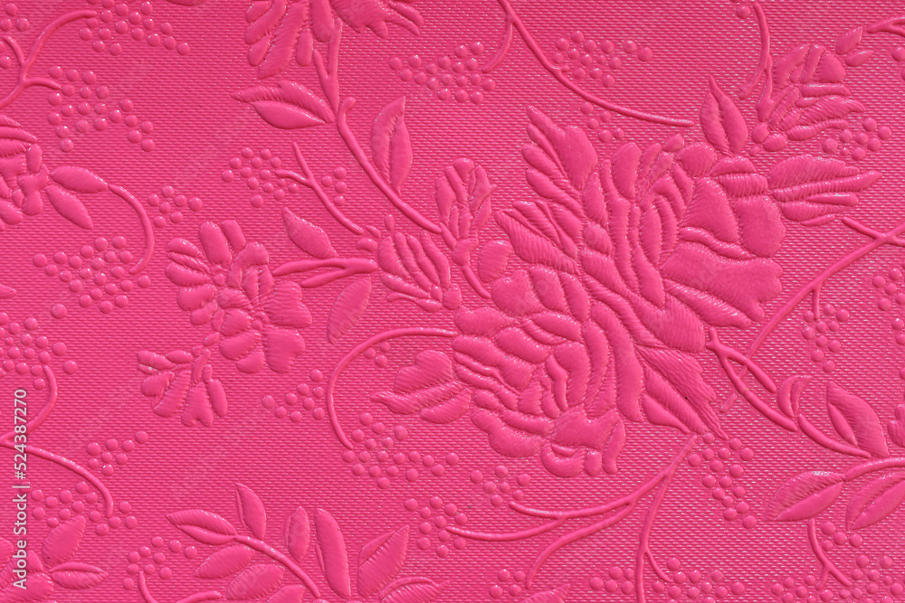 Fototapeta premium Tooled floral pattern in pink leather.