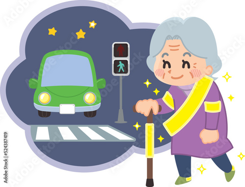 反射板を付けて歩く高齢者　夜の交差点　交通安全