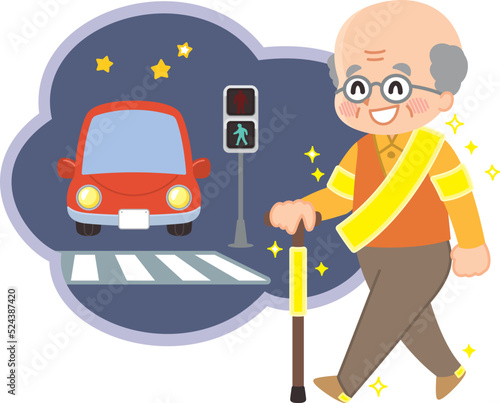 反射板を付けて歩く高齢者　夜の交差点　交通安全