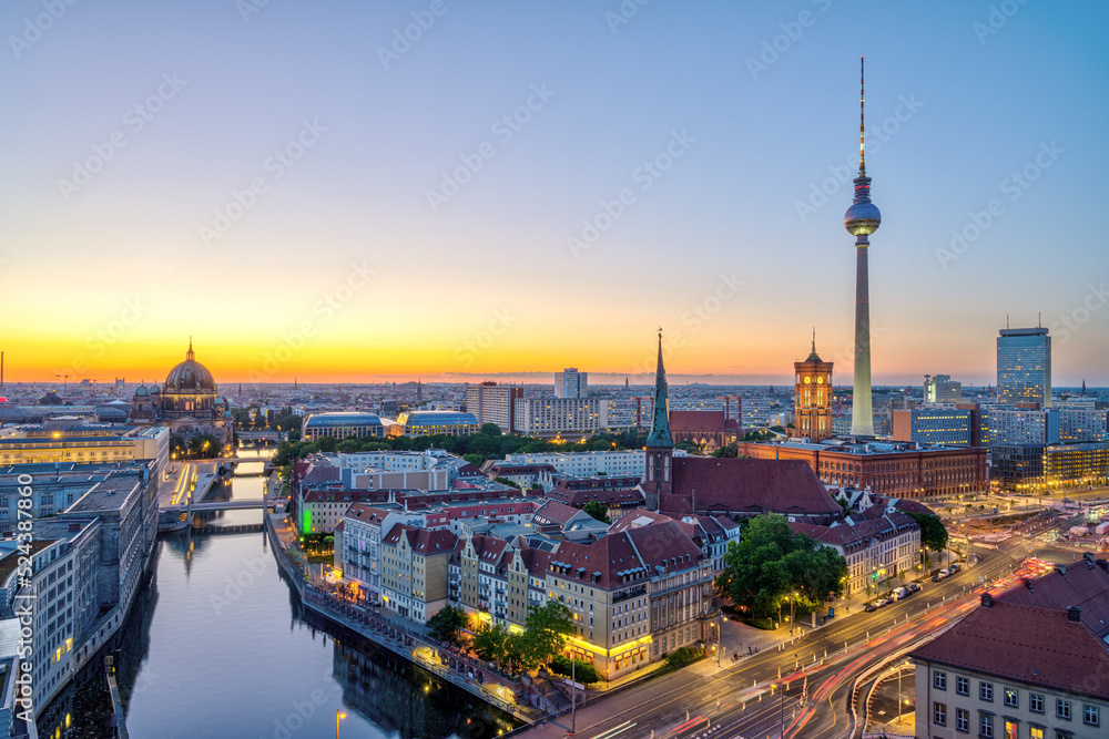 Downtown Berlin after sunset with the TV Tower, the river Spree and the cathedral