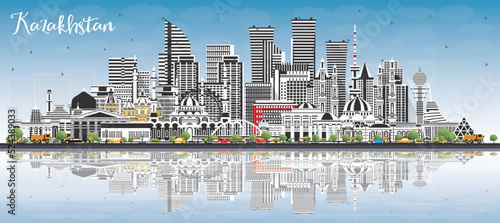 Kazakhstan City Skyline with Gray Buildings, Blue Sky and Reflections.