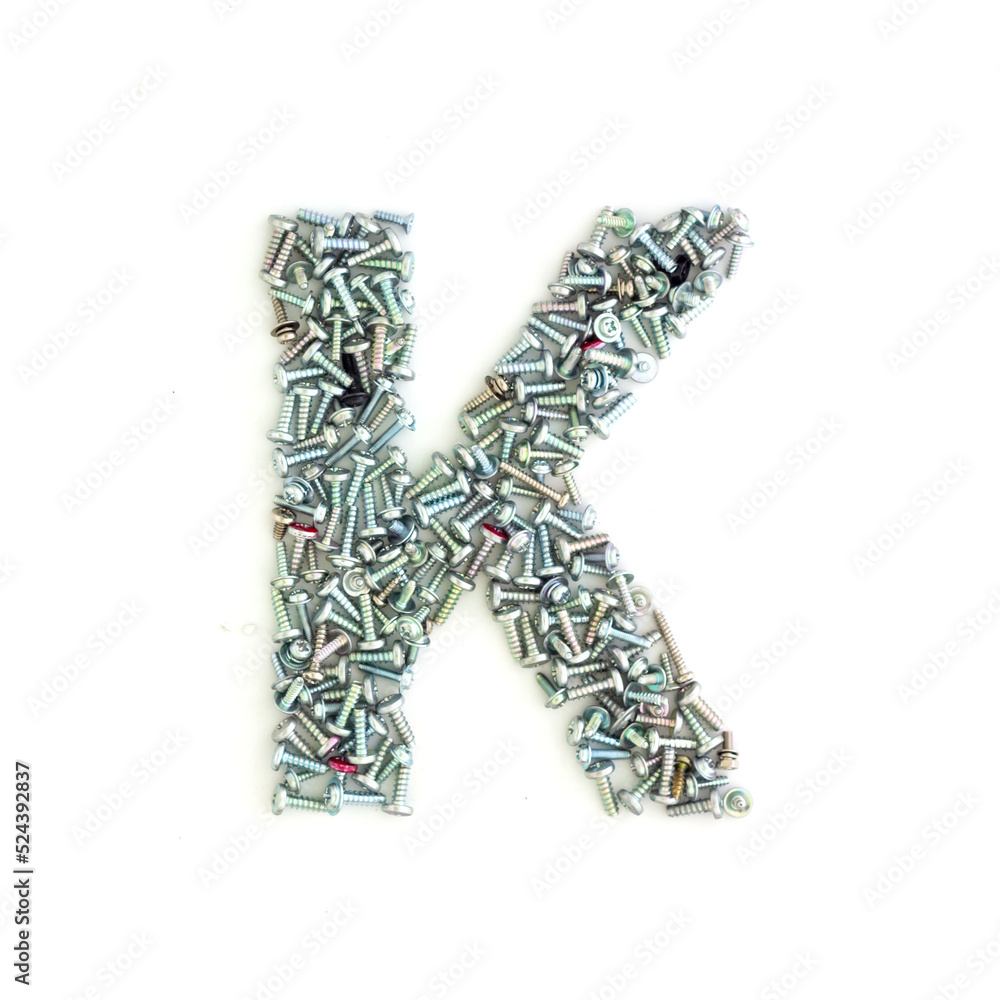 Capital letter K made from screws and bolts. Alphabet made from used screws. White background. Industrial bolt font Capital letter K made from screws and bolts. Alphabet made from used screws. White background. Industrial bolt font