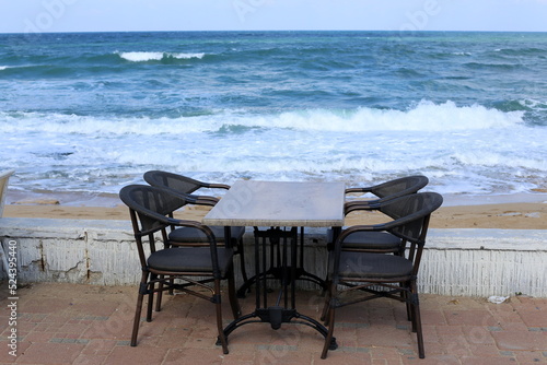 Chair for relaxing in a cafe on the Mediterranean coast © shimon