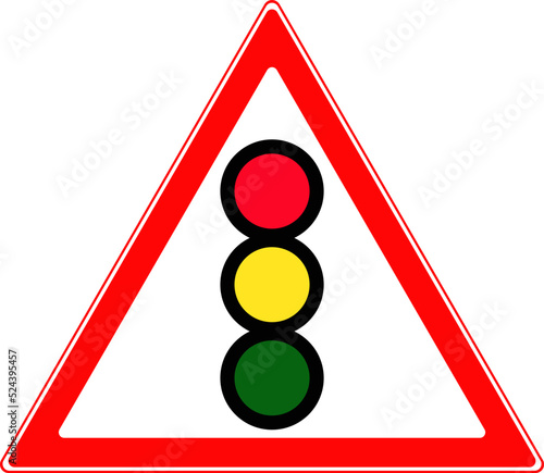 A road sign about traffic light regulation at an intersection.