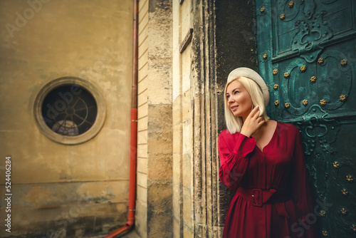 Portrait of a beautiful girl at an ancient door. Lviv. Ukraine