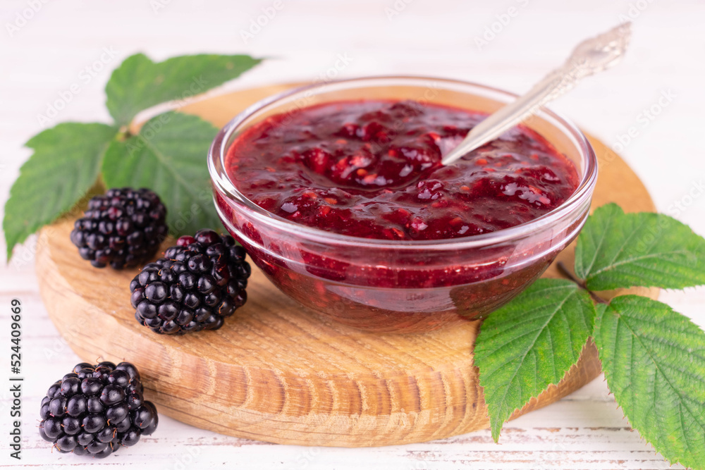 Blackberry jam in a glass bowl.Close-up.
Blackberry jam in a glass bowl.Close-up.