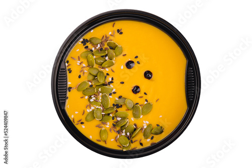 Hokkaido or butternut pumpkin soup with curry and seeds