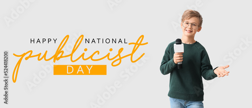 Little journalist with microphone on white background. National Publicist Day photo