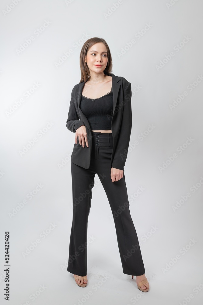 Full length body portrait of a young beautiful asian female businesswoman wearing full black business attire and pose with different gestures & emotions. Suitable for business presentation or slides. Full length body portrait of a young beautiful asian female businesswoman wearing full black business attire and pose with different gestures & emotions. Suitable for business presentation or slides.