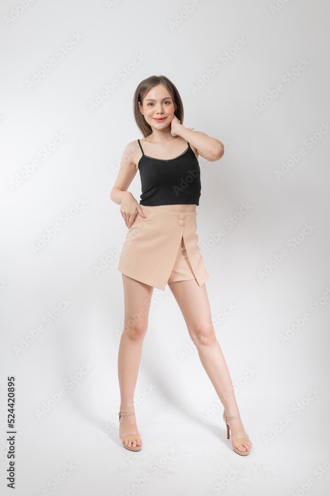 Full length body portrait of a young beautiful asian female business executive wearing stylish friday attire and pose with different gestures & emotions. Suitable for business presentation or slides Full length body portrait of a young beautiful asian female business executive wearing stylish friday attire and pose with different gestures & emotions. Suitable for business presentation or slides