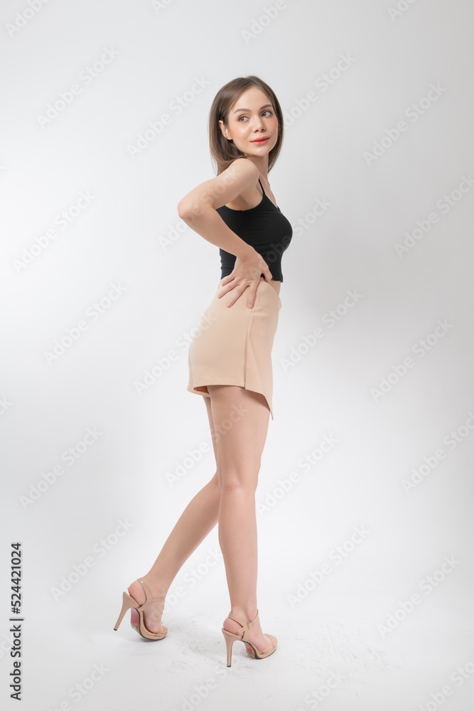 Full length body portrait of a young beautiful asian female business executive wearing stylish friday attire and pose with different gestures & emotions. Suitable for business presentation or slides Full length body portrait of a young beautiful asian female business executive wearing stylish friday attire and pose with different gestures & emotions. Suitable for business presentation or slides