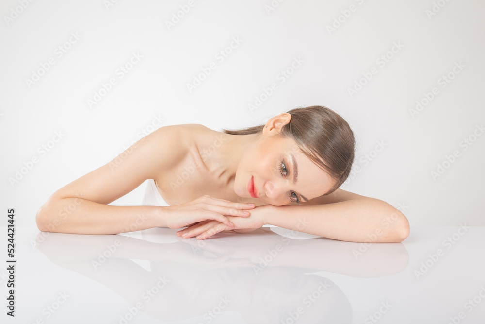 Portrait of a beautiful young asian female woman lady with clean, fresh and healthy smooth fair skin. Suitable for cosmetic, spa or massage advertisement, online social media and promotion sale usage. Portrait of a beautiful young asian female woman lady with clean, fresh and healthy smooth fair skin. Suitable for cosmetic, spa or massage advertisement, online social media and promotion sale usage.