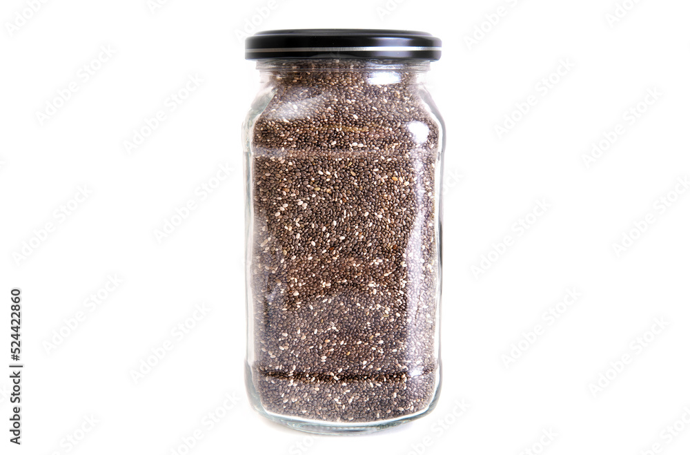 Jar of dry chia seeds isolated on white Jar of dry chia seeds isolated on white