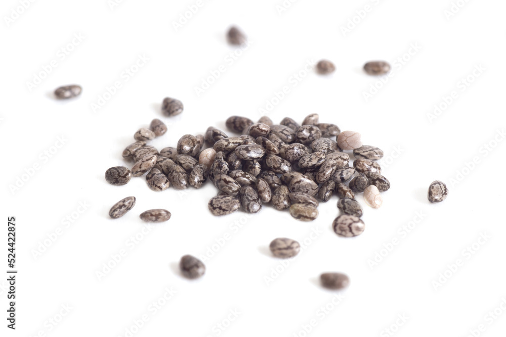 Close-up of dry chia seeds isolated on white Close-up of dry chia seeds isolated on white