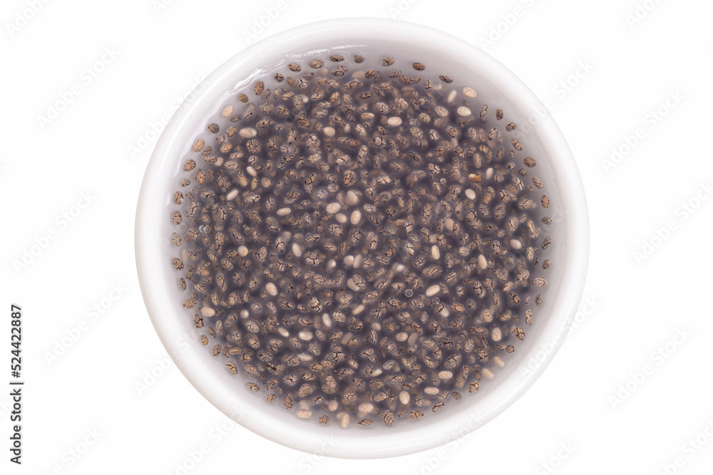 Chia seeds soaked in a small white cup Chia seeds soaked in a small white cup