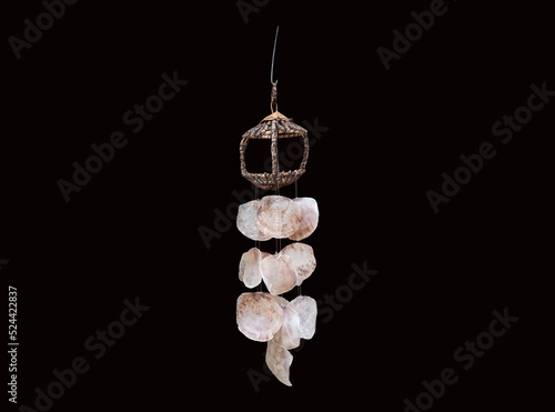 Seashell Wind Chime on isolated background photo