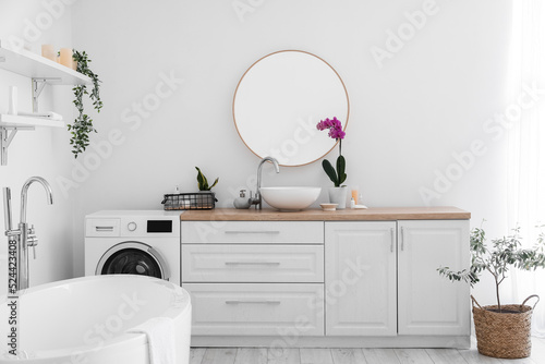 Interior of light bathroom ...