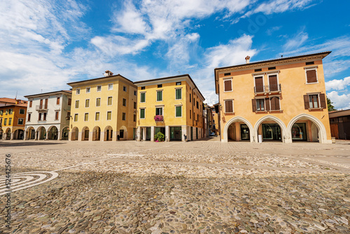 Tableau sur toile Main town square in Spilimbergo of medieval origins called Piazza Giuseppe Garibaldi (Giuseppe Garibaldi square), Pordenone province, Friuli-Venezia Giulia, Italy, southern Europe