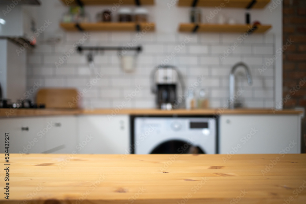 empty wooden tabletop and blurred kitchen mock up for product display