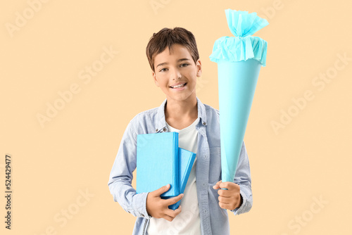 Little boy with blue school...