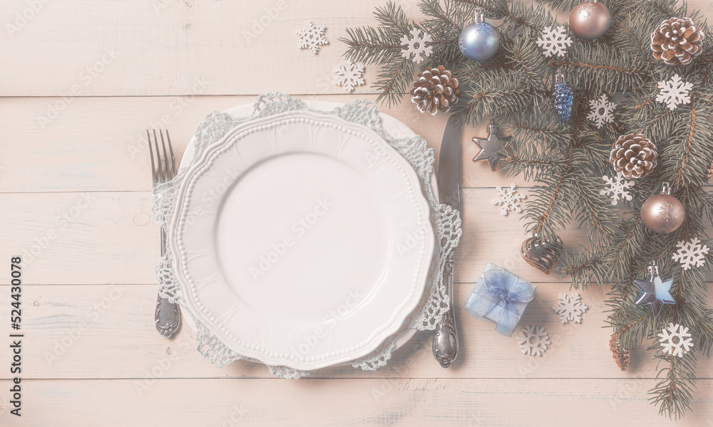 Christmas light table setting, menu concept. Pine tree branches, blue silver baubles, stars, hearts, cones, snowflakes. Christmas festive decoration, corner set. Flat lay, top view, copy space. Christmas light table setting, menu concept. Pine tree branches, blue silver baubles, stars, hearts, cones, snowflakes. Christmas festive decoration, corner set. Flat lay, top view, copy space.