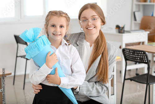 Cute little girl with blue ...