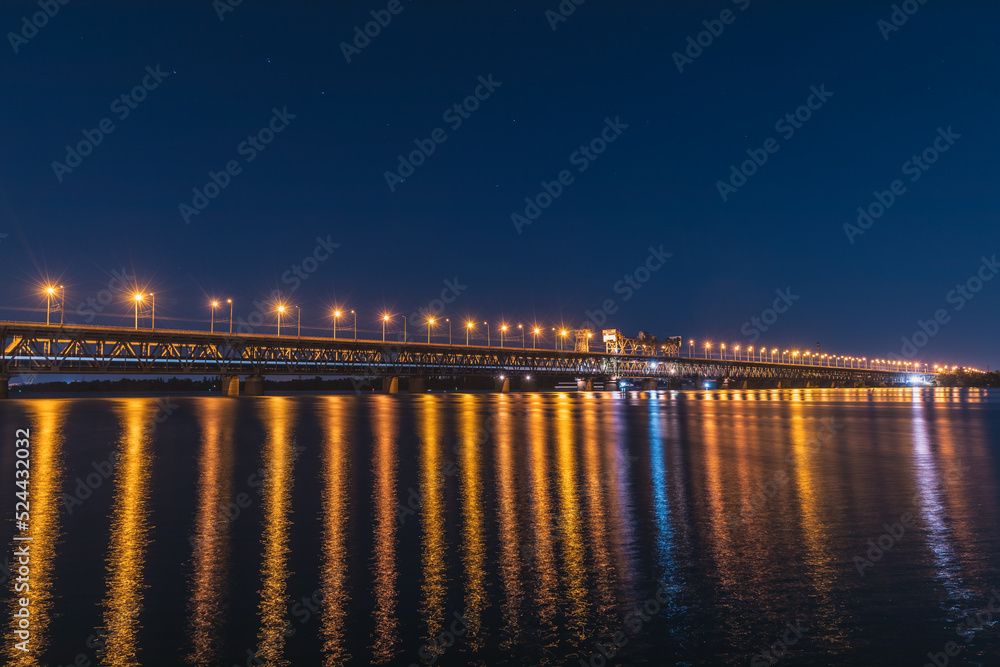 Classic panoramic view of the bridge. Bridge across the Dnieper river in the Ukrainian city of Dnepropetrovsk, Dnipro, Ukraine