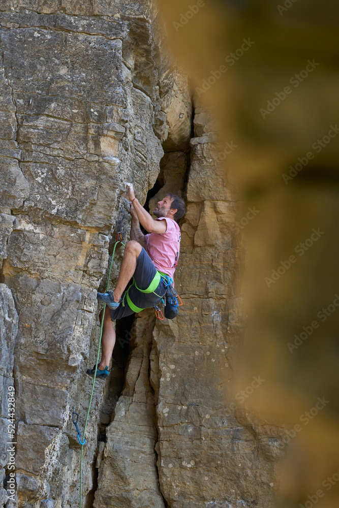 free climber in a difficult rock climbing tour in the Rockgardens in Hessigheim, Neckar valley, Baden-Wuerttemberg, Germany
free climber in a difficult rock climbing tour in the Rockgardens in Hessigheim, Neckar valley, Baden-Wuerttemberg, Germany
