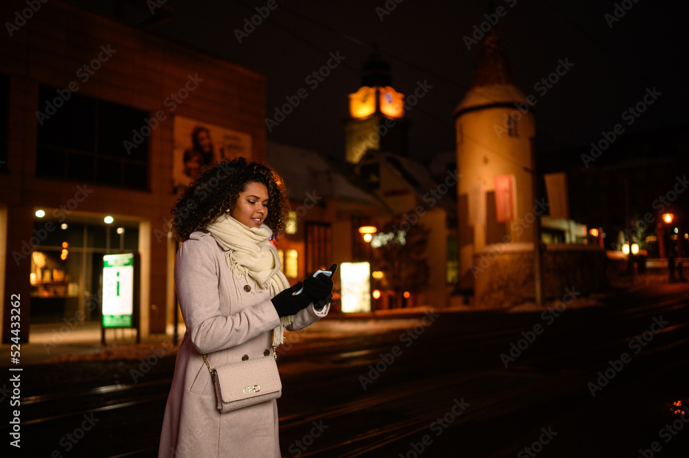 woman walking in the night city