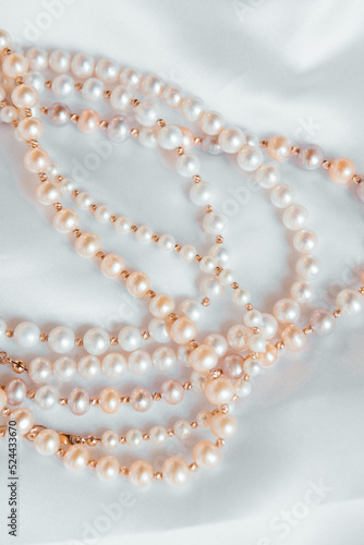 Pearls on white jewellery , necklace of pearl ,gold