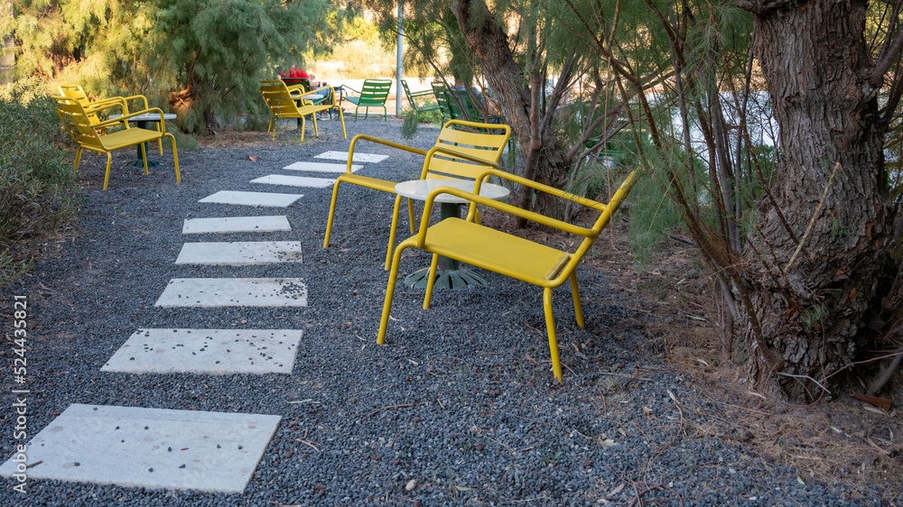 empty table and chair in open outdoor, front view