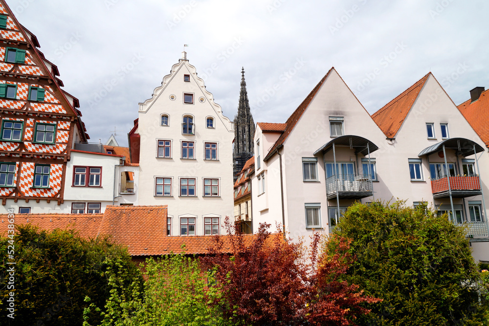 Scenic view of the Ulm City with its ancient Ulmer Minster and beautiful quaint old houses in Germany on a fine day in May (Germany, Europe)	
