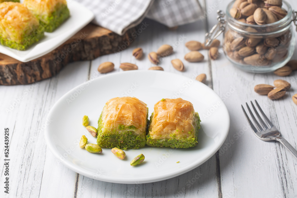 Traditional delicious Turkish dessert; pistachio baklava (Turkish name; kuru baklava) Traditional delicious Turkish dessert; pistachio baklava (Turkish name; kuru baklava)
