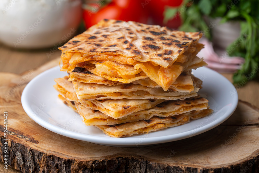 Traditional delicious Turkish food; Potato Pie (Turkish name; patatesli gozleme - gozleme) Traditional delicious Turkish food; Potato Pie (Turkish name; patatesli gozleme - gozleme)