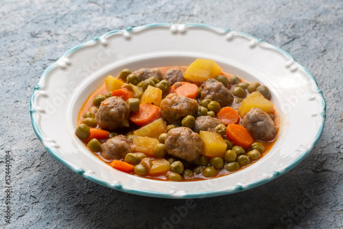 Turkish Food Green Pea Stew with Meatballs - Kofte or Kofta Bezelye. (Turkish name; kofteli bezelye)