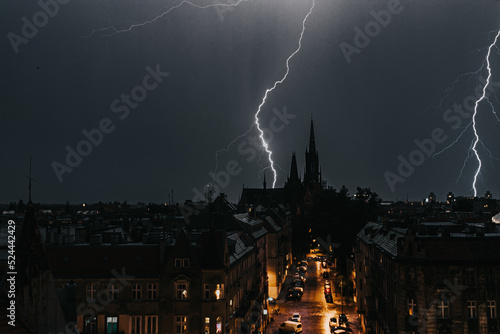 Lightning over the city at night (ID: 524442429)