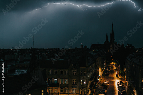 Lightning over the city at night (ID: 524442446)