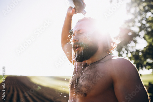 Man with water in forest