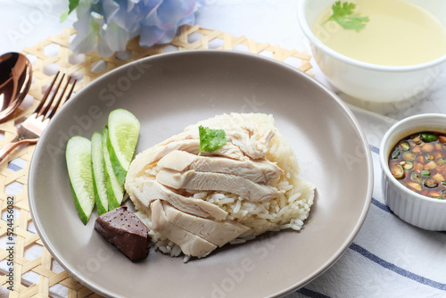 Hainanese chicken rice with soup and spicy soy sauce  - In Thai called Kao Man Gai