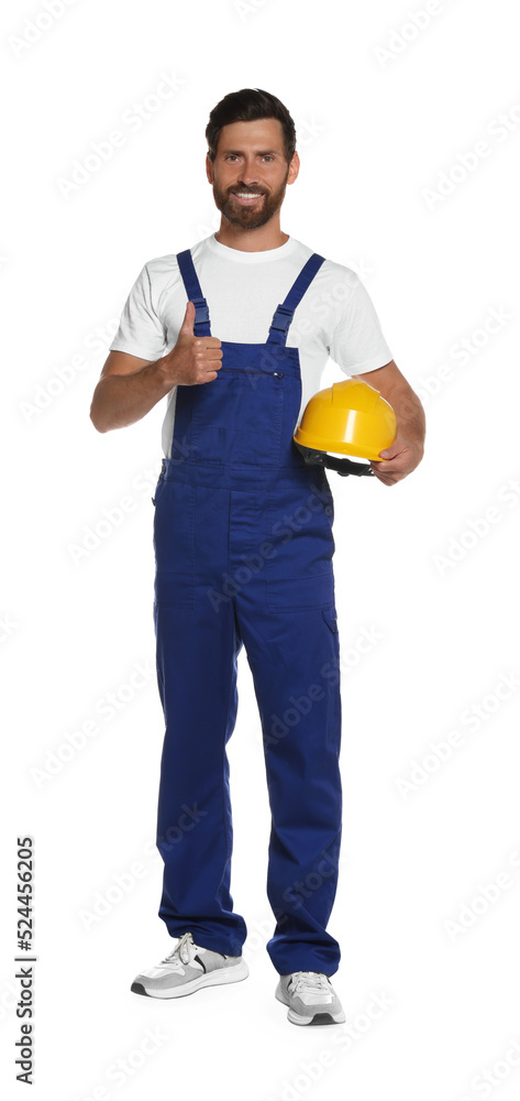 Professional builder in uniform with hard hat isolated on white Professional builder in uniform with hard hat isolated on white