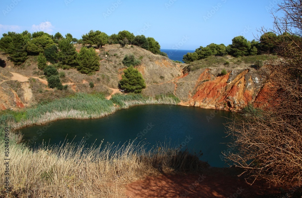 Italy, Salento: Small bauxite lake near Otranto.