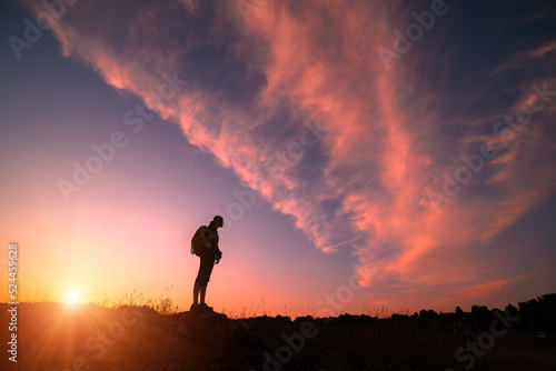 Girl hiker silhouette © Bashkatov