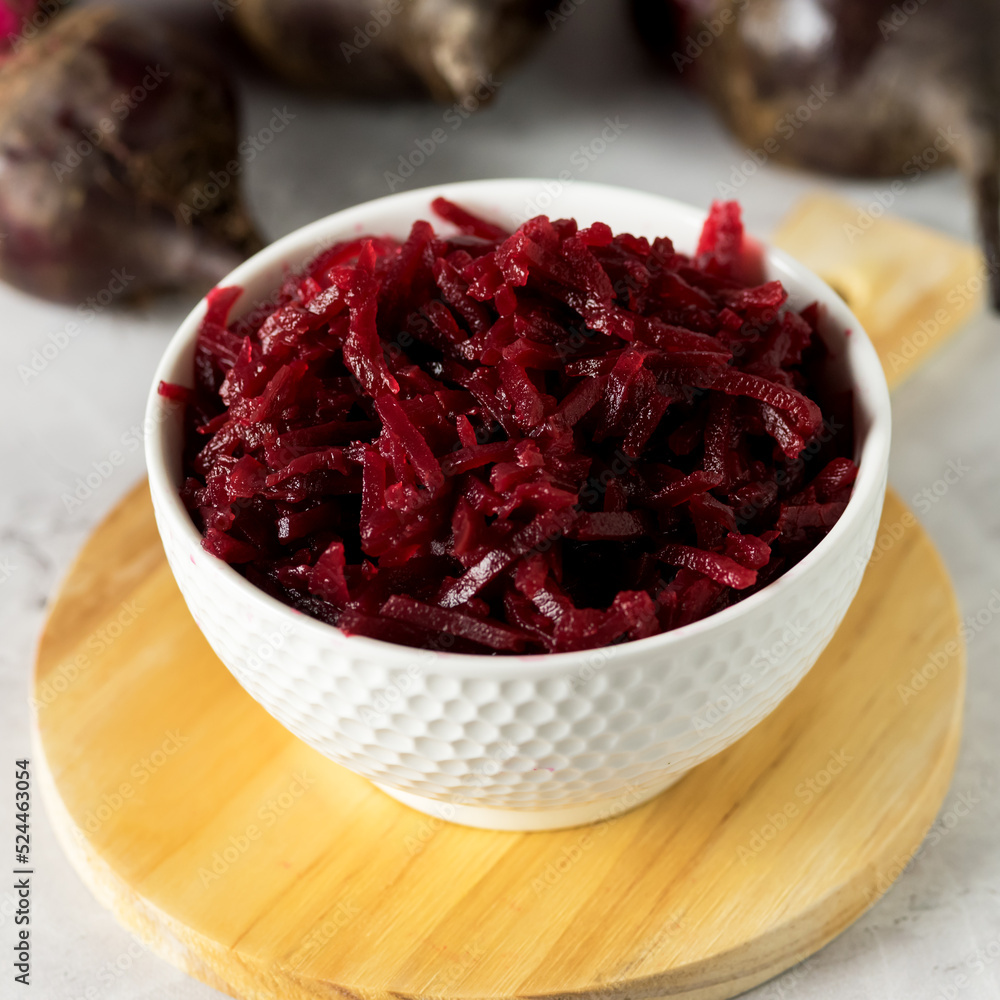 White Bowl with Fermented Canned Beetroot on Wooden Cutting Board Gray Background Square White Bowl with Fermented Canned Beetroot on Wooden Cutting Board Gray Background Square