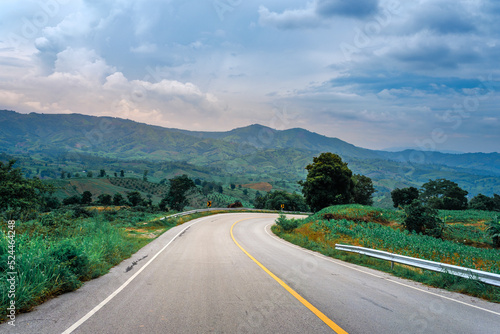 Country Road with Mountain and blue sky