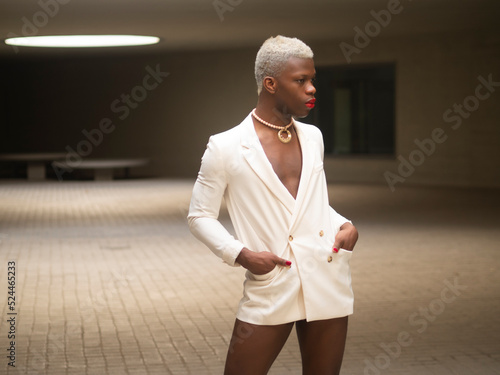 Tableau sur toile Black androgynous man in elegant jacket