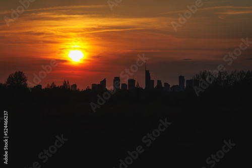 Sunset over downtown of Warsaw city in Poland
