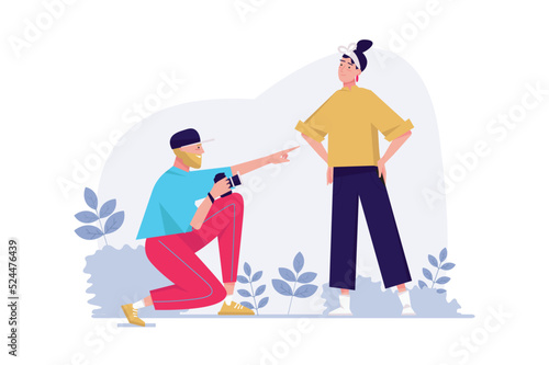 Photo studio concept with people scene in the flat cartoon design. Photographer explains to the models how to pose better so that the photo will be cool. Vector illustration.