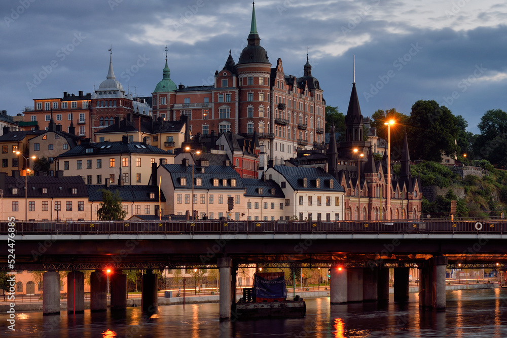 Historic buildings and palace on Södermalm island in Stockholm at evening time